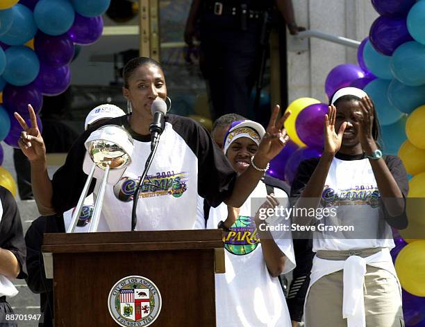 Lisa Leslie of the Los Angeles Sparks celebrate their WNBA Championship with fans on the steps of Los Angeles City Hall after becoming the first team...