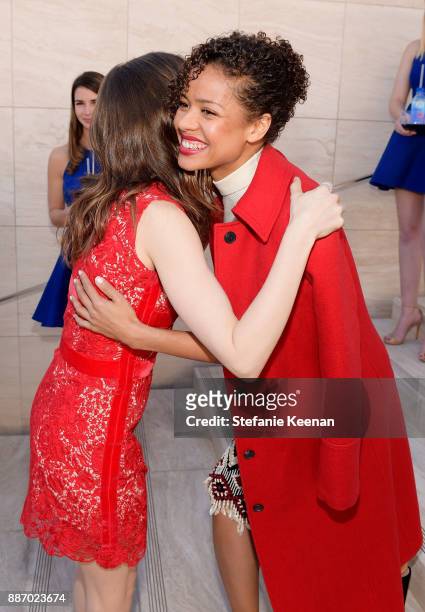 Gugu Mbatha-Raw and Lily Collins at The Hollywood Reporter's 26th Annual Women In Entertainment Breakfast presented in partnership with FIJI Water at...