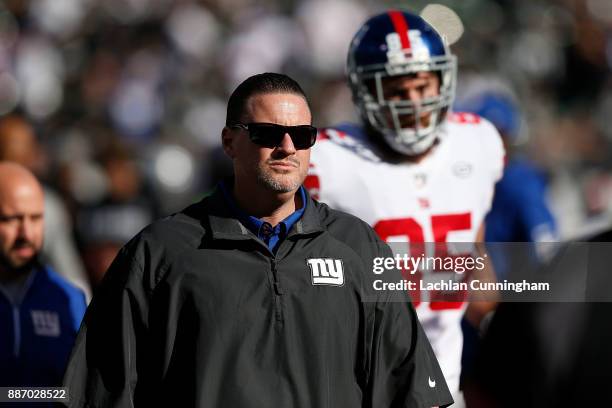 New York Giants head coach Ben McAdoo leaves the field after the Warm up before their game against the Oakland Raiders at Oakland-Alameda County...