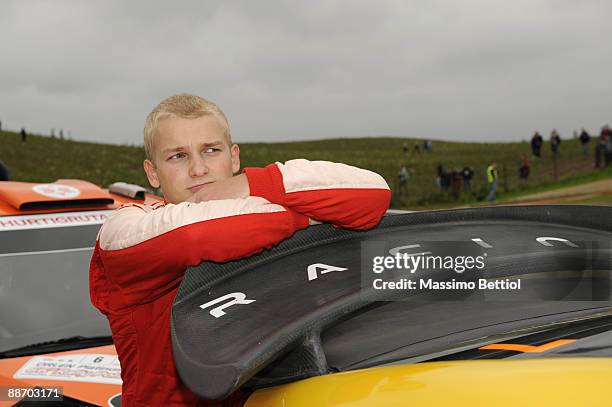 Evgeny Novikov of Russia in the service park during the Leg 1 of the WRC Rally of Poland in Mikolajki , Poland