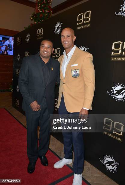 Shawn Wooden and Jason Taylor attend The Miami Dolphins 'Hall of Fame Celebration' hosting Jason Taylor at Hard Rock Stadium on December 02, 2017 in...