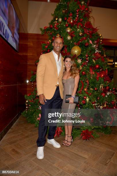 Jason Taylor and Monica Velasco attend The Miami Dolphins 'Hall of Fame Celebration' hosting Jason Taylor at Hard Rock Stadium on December 02, 2017...