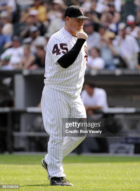 Bobby Jenks of the Chicago White Sox reacts after recording the third out against the Los Angeles Dodgers on June 25, 2009 at U.S. Cellular Field in...