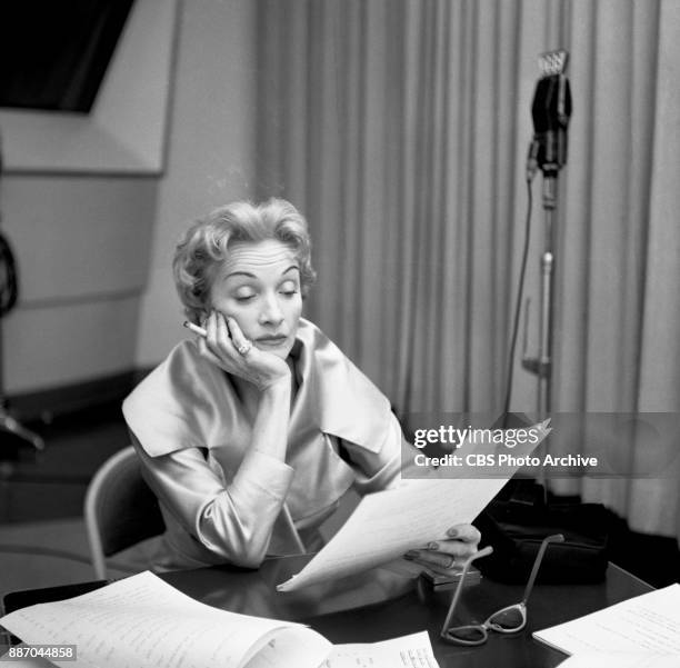 Marlene Dietrich while recording. She portrays Dianne La Volte on the CBS Radio adventure drama program A Time For Love. October 16, 1953. New York,...