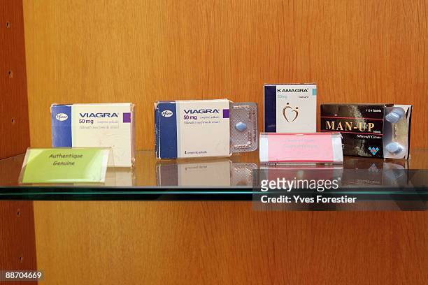 Genuine and counterfeit Viagra displayed at The Counterfeit Museum on June 25, 2009 in Paris, France. The museum serves to highlight the impact that...