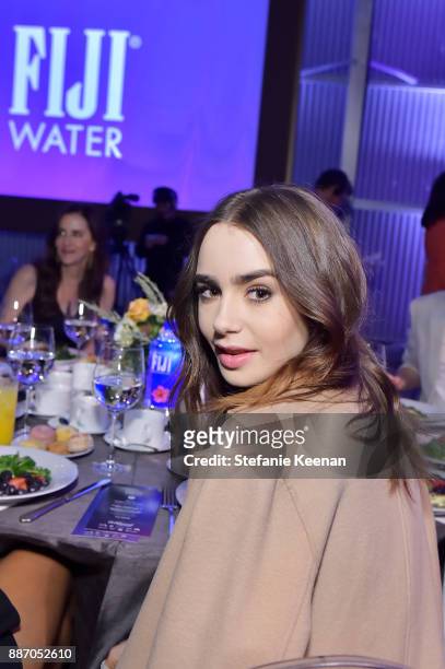 Lily Collins at The Hollywood Reporter's 26th Annual Women In Entertainment Breakfast presented in partnership with FIJI Water at Milk Studios on...