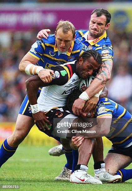 Semi Tadulala of Bradford Bulls is stopped in his tracks during the Engage Super League match between Leeds Rhinos and Bradford Bulls at Headingley...