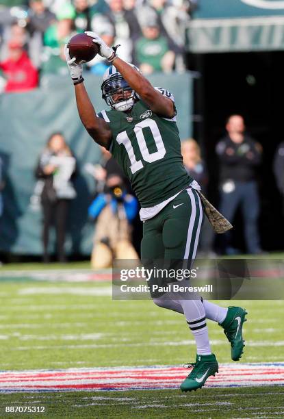 Jermaine Kearse of the New York Jets pulls in a pass for a gain in the first quarter in an NFL football game against the Carolina Panthers on...