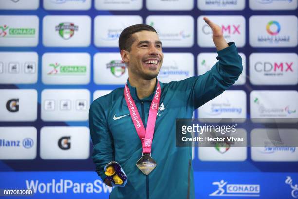 Daniel Dias of Brazil smiles with his gold medal in Men's 50 m Backstroke S5 during day 3 of the Para Swimming World Championship Mexico City 2017 at...