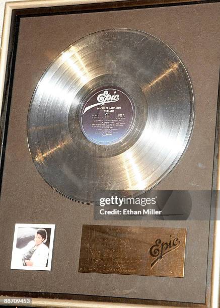 An RIAA platinum record award presented to Steve Manning for his contribution to making the Michael Jackson album, "Thriller" is displayed during an...