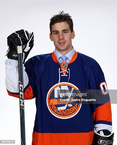 John Tavares of the New York Islanders poses for a photo after being selected first overall by New York Islanders with their first pick in the first...