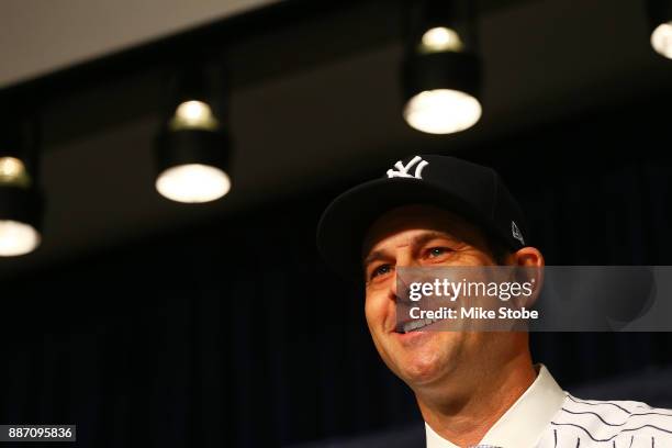 Aaron Boone speaks to the media after being introduced as manager of the New York Yankees at Yankee Stadium on December 6, 2017 in the Bronx borough...