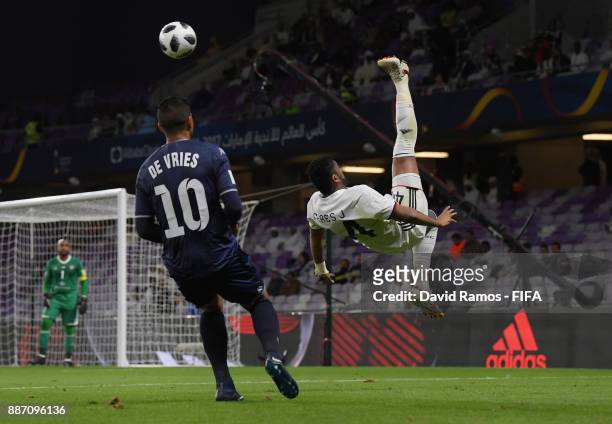 Fares Juma of Al-Jazira clears the ball while under pressure from Ryan de Vries of Auckland City FC during the FIFA Club World Cup UAE 2017 play off...
