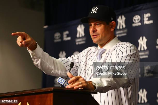 Aaron Boone speaks to the media after being introduced as manager of the New York Yankees at Yankee Stadium on December 6, 2017 in the Bronx borough...