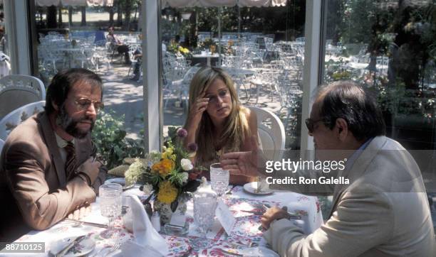 Actress Farrah Fawcett, her manager Jay Bernstein and NY Times movie critic Bosley Crowther on August 8, 1979 enjoy lunch as Mr. Crowther interviews...