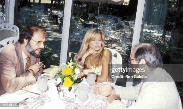 Actress Farrah Fawcett, her manager Jay Bernstein and NY Times movie critic Bosley Crowther on August 8, 1979 enjoy lunch as Mr. Crowther interviews...