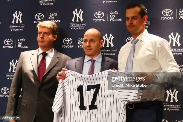 Managing General Partner, Co-Chairperson Hal Steinbrenner, Senior Vice President, General Manager Brian Cashman and Aaron Boone pose for a photo at...