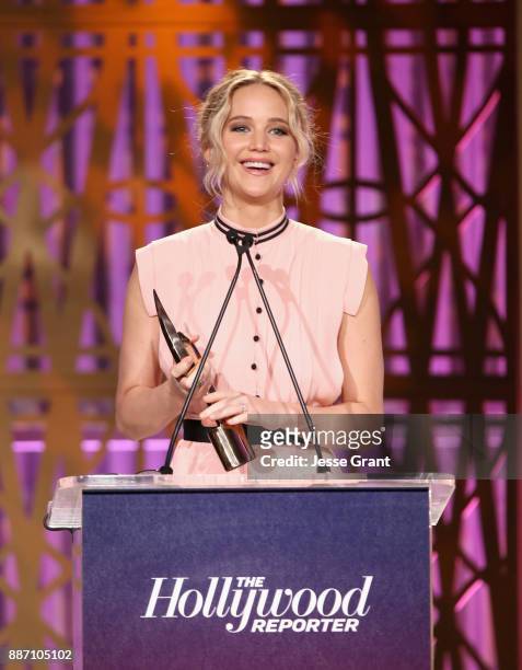 Honoree Jennifer Lawrence accepts award onstage at The Hollywood Reporter's 2017 Women In Entertainment Breakfast at Milk Studios on December 6, 2017...
