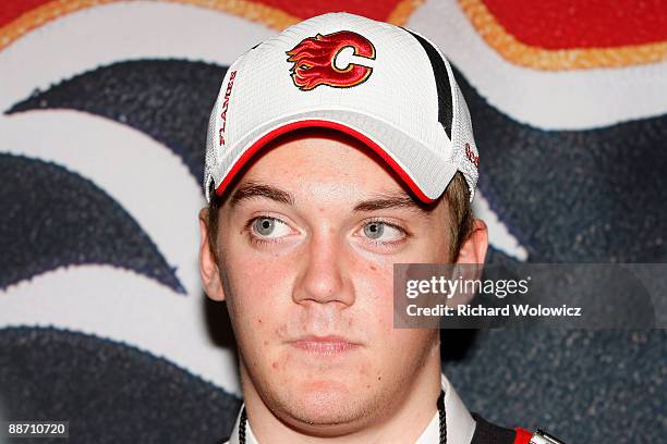 Tim Erixon of the Calgary Flames talks to the media after he was selected overall by the Flames during the first round of the 2009 NHL Entry Draft at...