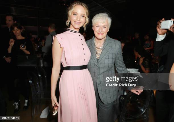 Honoree Jennifer Lawrence and Glenn Close attend The Hollywood Reporter's 2017 Women In Entertainment Breakfast at Milk Studios on December 6, 2017...