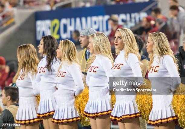 Trojans cheerleader watches the clock during the final minutes of the PAC-12 Championship game between the USC Trojans and the Stanford Cardinals on...