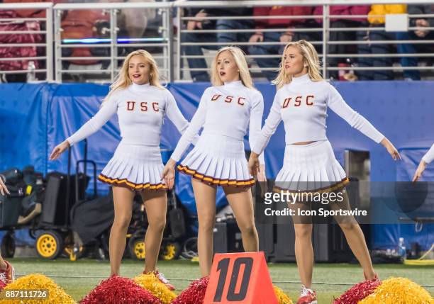 Trio of USC Trojans cheerleaders celebrate the win during the PAC-12 Championship game between the USC Trojans and the Stanford Cardinals on Friday,...