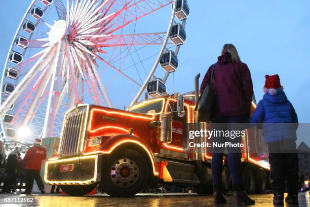 Hundreds of people gather to see the Christmas Coca Cola truck in Gdansk, Poland on 6 December 2017 Freightliner FLD Conventional truck is 16.5 m...