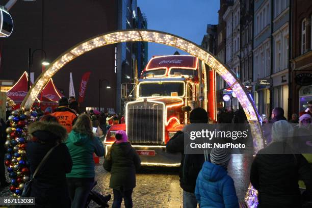Hundreds of people gather to see the Christmas Coca Cola truck in Gdansk, Poland on 6 December 2017 Freightliner FLD Conventional truck is 16.5 m...