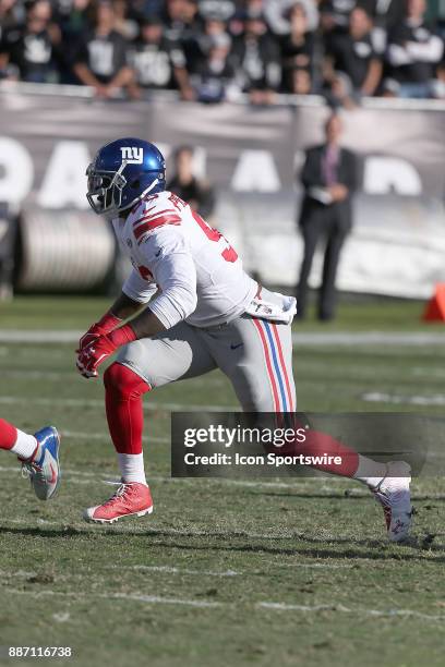 New York Giants defensive end Jason Pierre-Paul rushes the passer during an NFL game at the Oakland Coliseum against the Oakland Raiders on December...