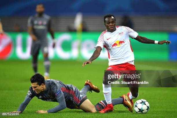 Matej Mitrovic of Besiktas is challenged by Bruma of RB Leipzig during the UEFA Champions League group G match between RB Leipzig and Besiktas at Red...