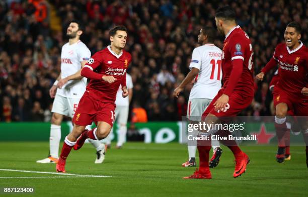 Philippe Coutinho of Liverpool celebrates after scoring his sides first goal during the UEFA Champions League group E match between Liverpool FC and...