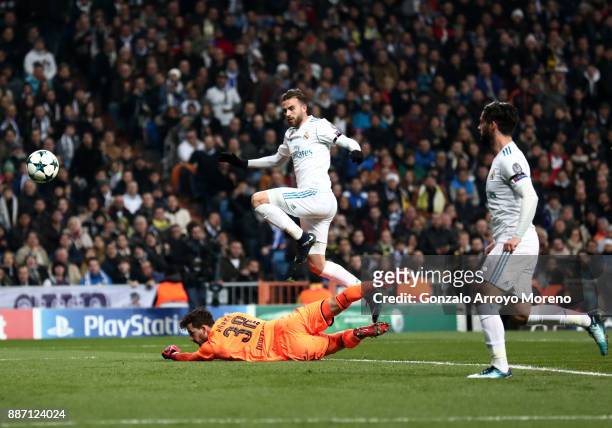 Borja Mayoral of Real Madrid scores his sides first goal past Roman Buerki of Borussia Dortmund during the UEFA Champions League group H match...