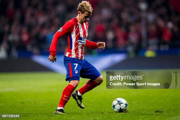 Antoine Griezmann of Atletico de Madrid runs with the ball during the UEFA Champions League 2017-18 match between Atletico de Madrid and AS Roma at...