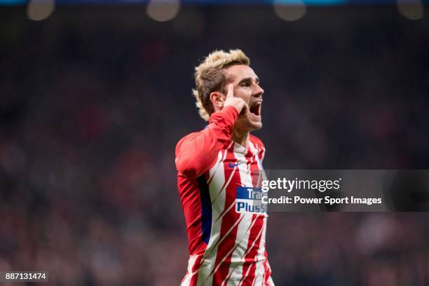 Antoine Griezmann of Atletico de Madrid cerebrating after score a goal during the UEFA Champions League 2017-18 match between Atletico de Madrid and...