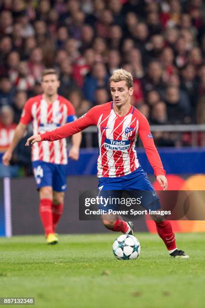 Antoine Griezmann of Atletico de Madrid runs with the ball during the UEFA Champions League 2017-18 match between Atletico de Madrid and AS Roma at...