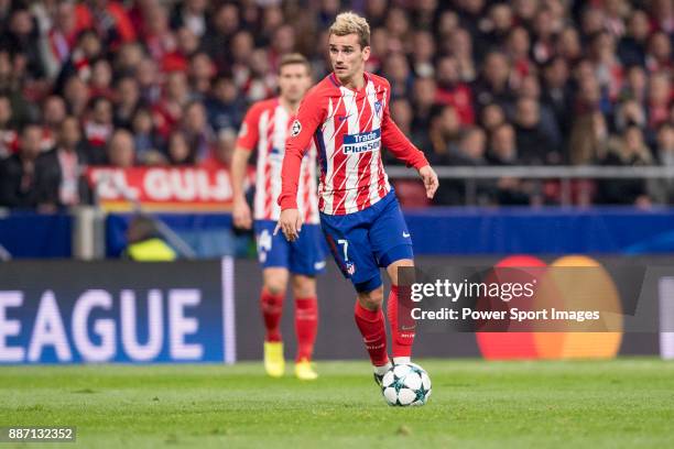 Antoine Griezmann of Atletico de Madrid runs with the ball during the UEFA Champions League 2017-18 match between Atletico de Madrid and AS Roma at...