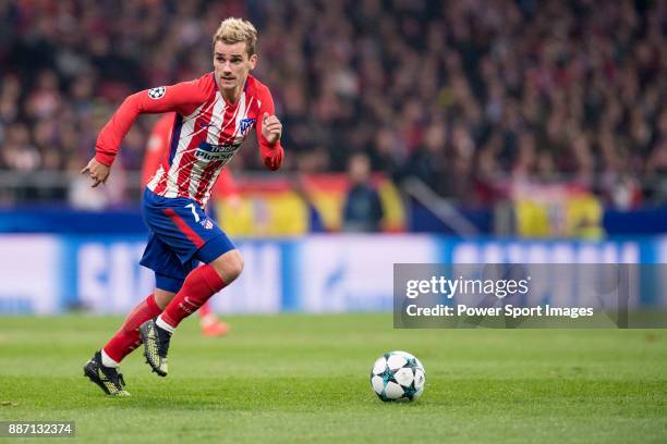 Antoine Griezmann of Atletico de Madrid runs with the ball during the UEFA Champions League 2017-18 match between Atletico de Madrid and AS Roma at...