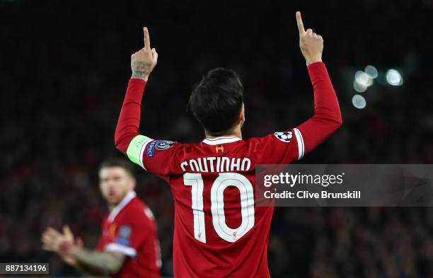 Philippe Coutinho of Liverpool celebrates after scoring his sides secong goal during the UEFA Champions League group E match between Liverpool FC and...