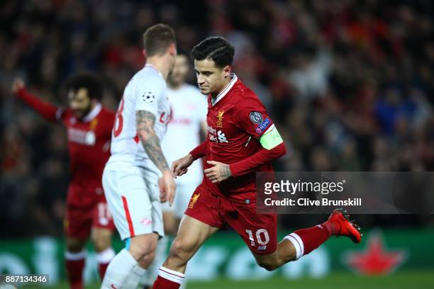Philippe Coutinho of Liverpool celebrates after scoring his sides secong goal during the UEFA Champions League group E match between Liverpool FC and...