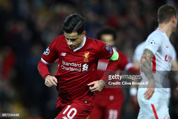Philippe Coutinho of Liverpool celebrates after scoring his sides second goal during the UEFA Champions League group E match between Liverpool FC and...