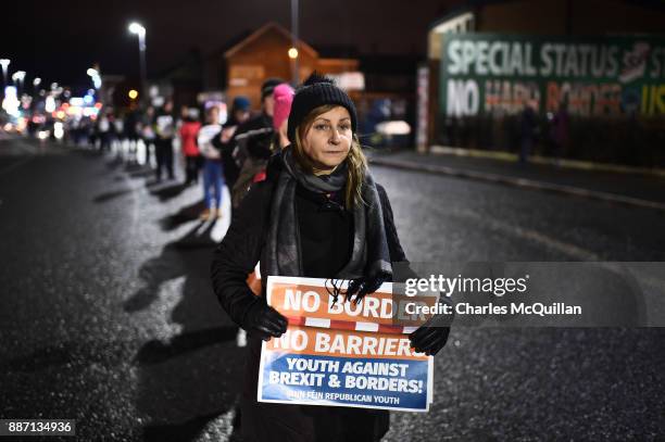 Sinn Fein protestors hold an anti-Brexit white line rally on December 6, 2017 in Belfast, Northern Ireland. Brexit negotiations broke down earlier...
