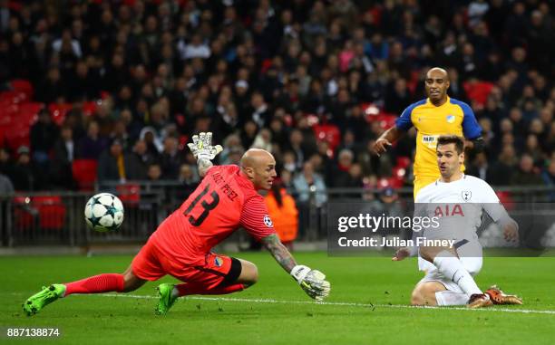 Fernando Llorente of Tottenham Hotspur scores his sides first goal past Nauzet Perez of Apoel FC during the UEFA Champions League group H match...