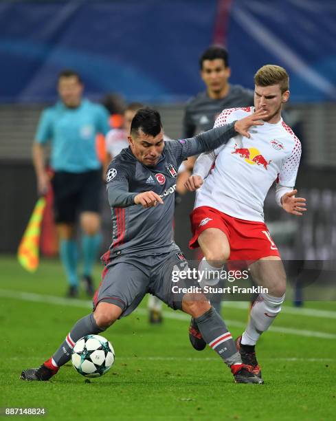 Gary Medel of Besiktas is challenged by Timo Werner of RB Leipzig during the UEFA Champions League group G match between RB Leipzig and Besiktas at...