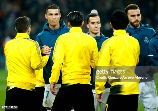Cristiano Ronaldo of Real Madrid shakes hands with the Borussia Dortmund players prior to the UEFA Champions League group H match between Real Madrid...