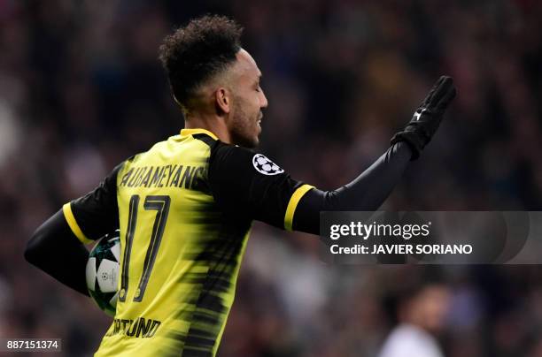 Dortmund's Gabonese forward Pierre-Emerick Aubameyang celebrates a goal during the UEFA Champions League group H football match Real Madrid CF vs...