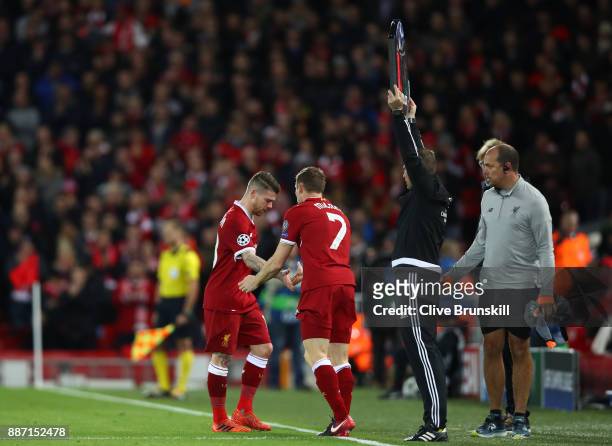 Alberto Moreno of Liverpool is subbed for James Milner of Liverpool during the UEFA Champions League group E match between Liverpool FC and Spartak...