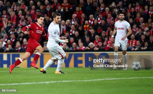 Philippe Coutinho of Liverpool scores his sides fifth goal during the UEFA Champions League group E match between Liverpool FC and Spartak Moskva at...