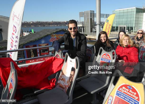 Singer and actor James Maslow unveils his Ride Of Fame IT Bus at Pier 78 on December 6, 2017 in New York City.