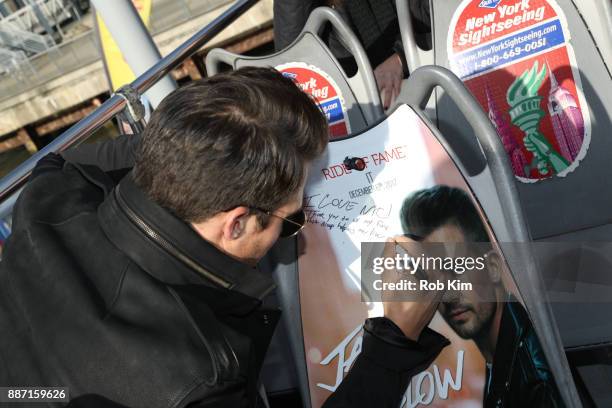 Singer and actor James Maslow unveils his Ride Of Fame IT Bus at Pier 78 on December 6, 2017 in New York City.