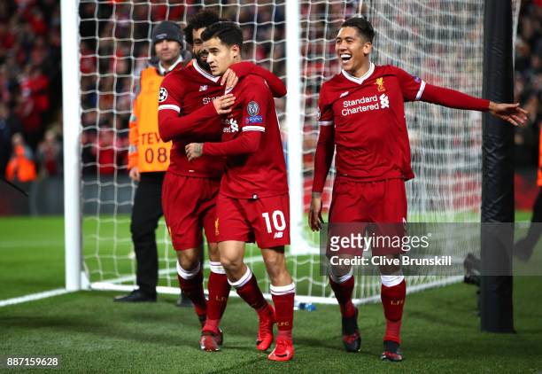 Philippe Coutinho of Liverpool celebrates after scoring his sides fifth goal with Mohamed Salah of Liverpool and Roberto Firmino of Liverpool during...